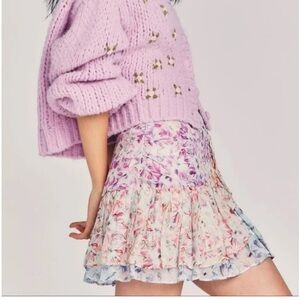 LoveShackFancy Skirt size 6 . 100% silk . Color pink and purple Flowers .